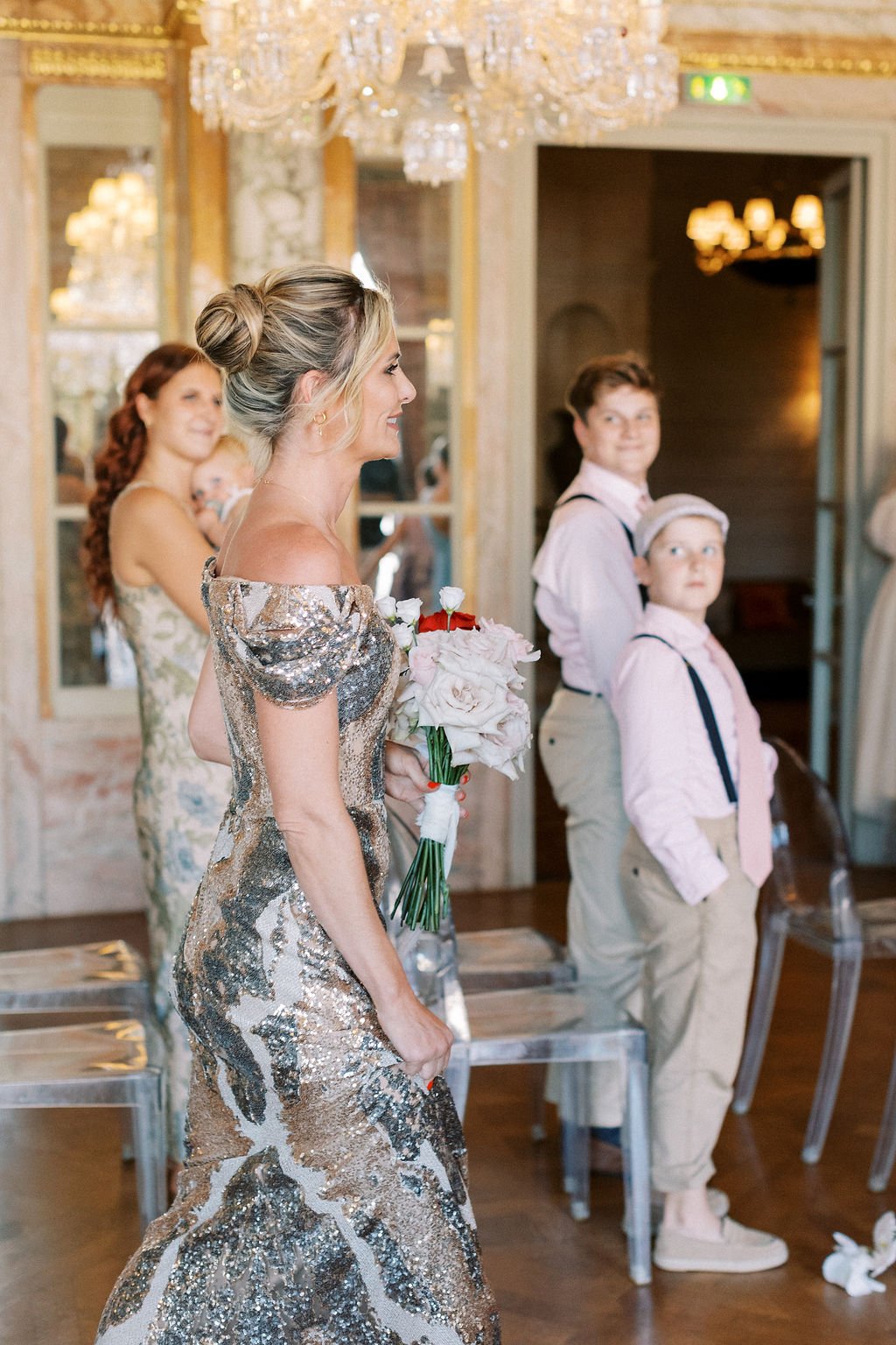 Glamorous Australian bride walking down the aisle at hotel