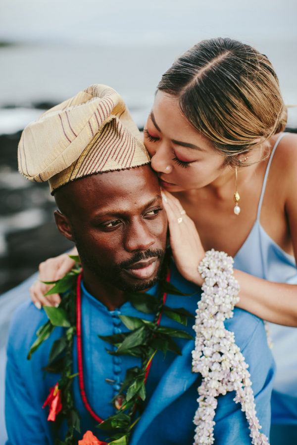 bride kisses her groom at Kona Beach