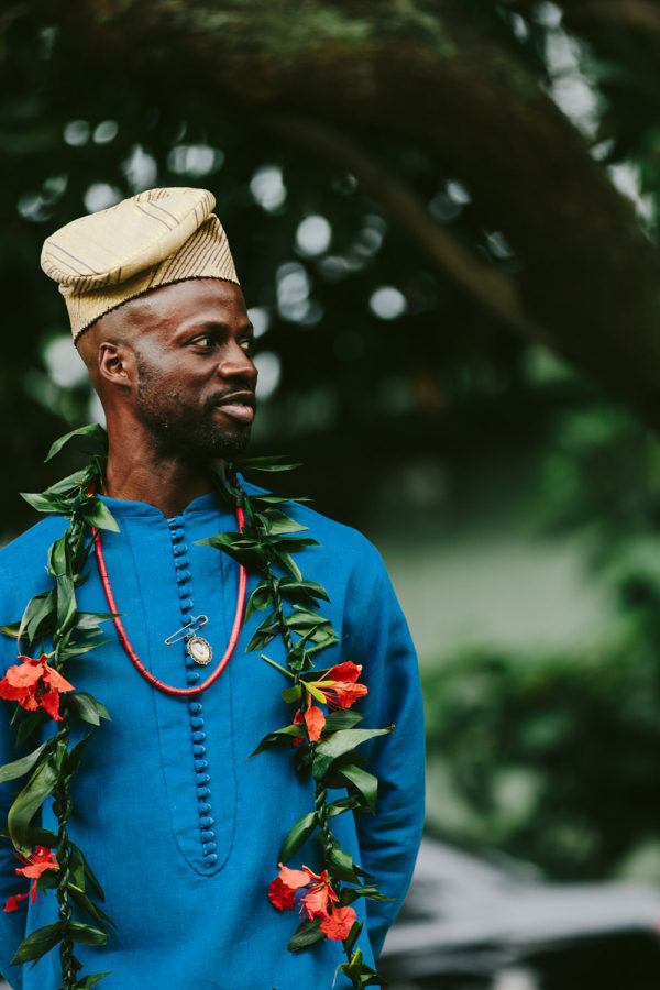 groom's blue ceremony outfit with custom lei