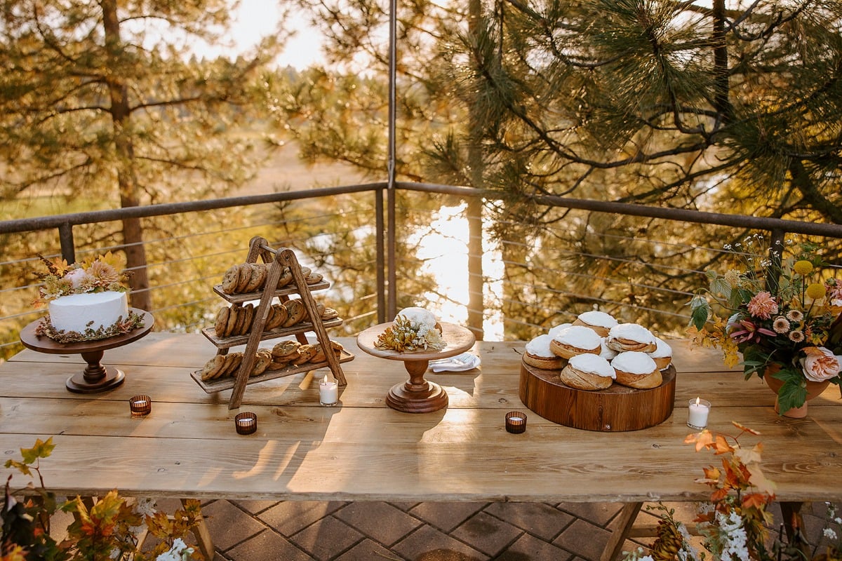 fall desert table for wedding with cinnamon rolls