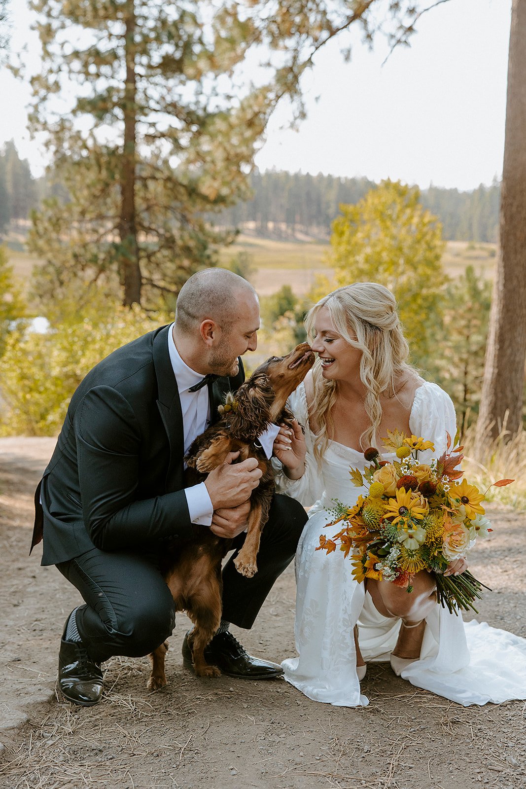 boho wedding with dog and wildflower bouquet