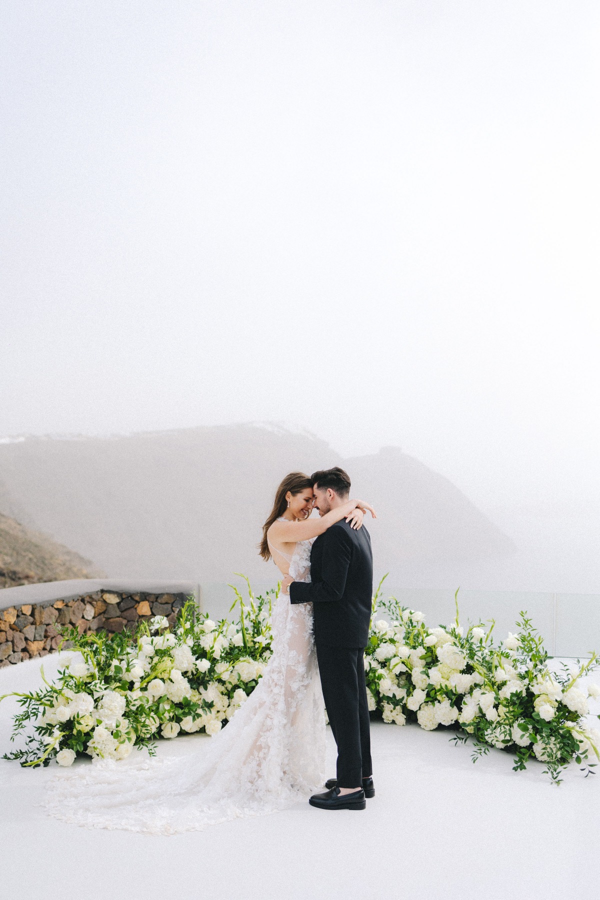 floor wedding ceremony arrangement with white flowers