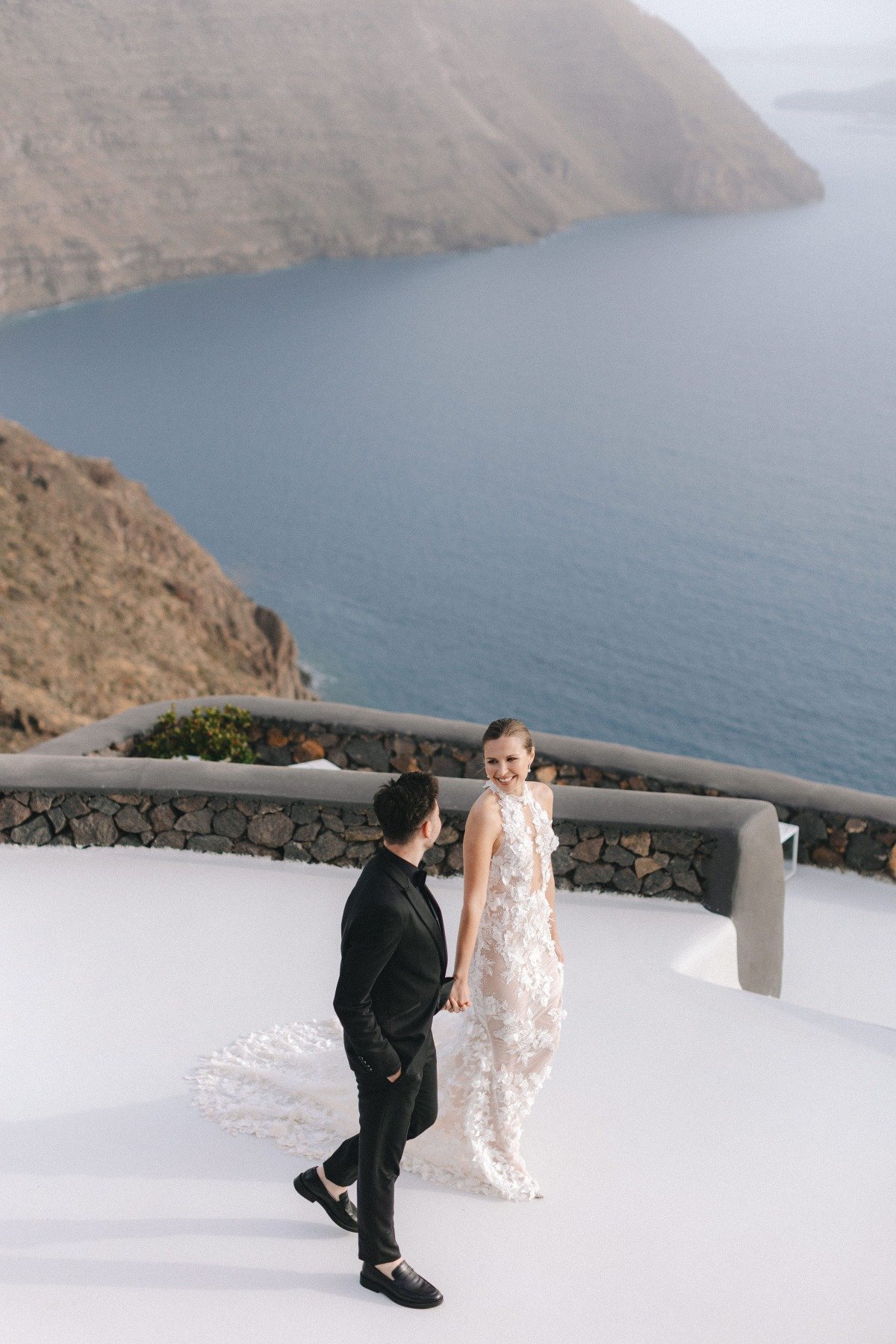 Misty cliffside wedding inspiration in santorini greece