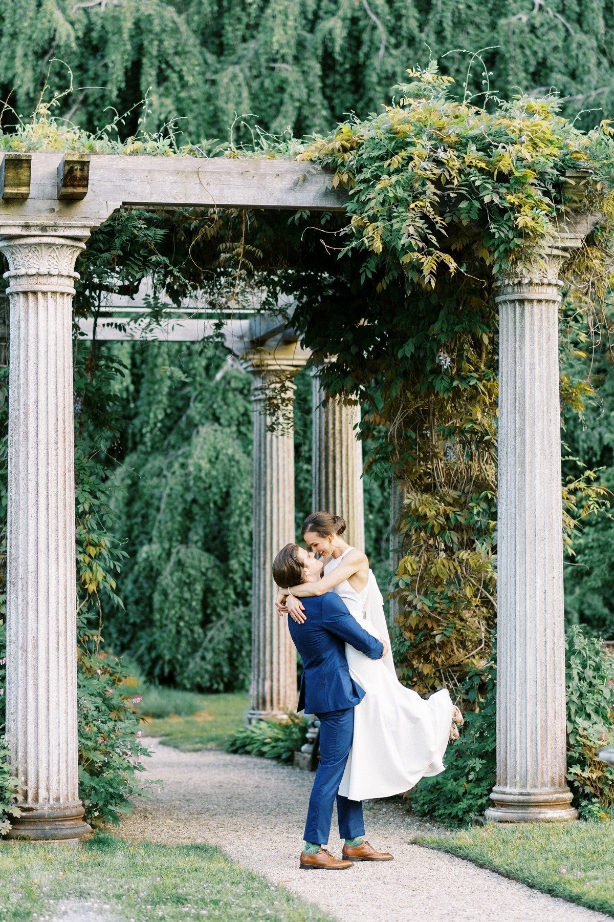 bride and groom portrait with columns