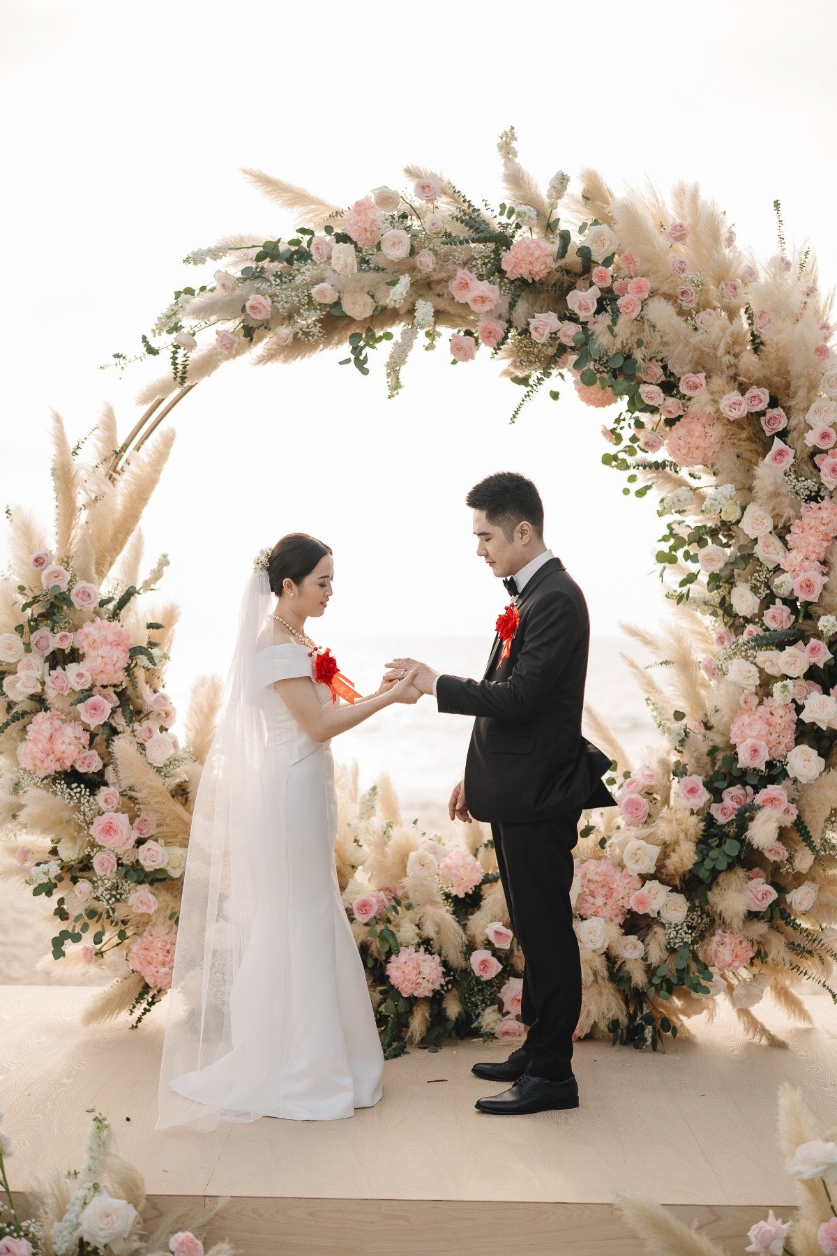 pink rose and dried pampas floral arch