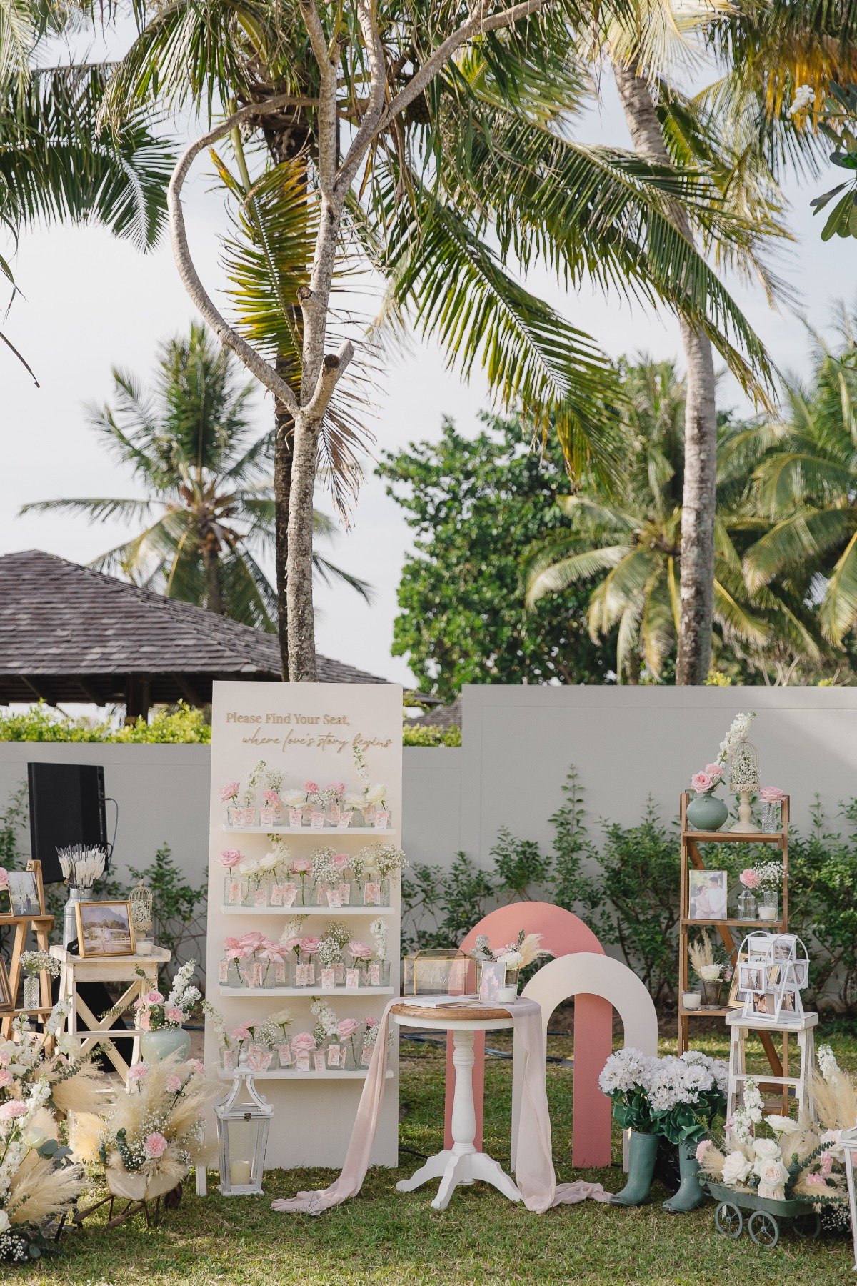 garden-inspired guest book and seating wall area