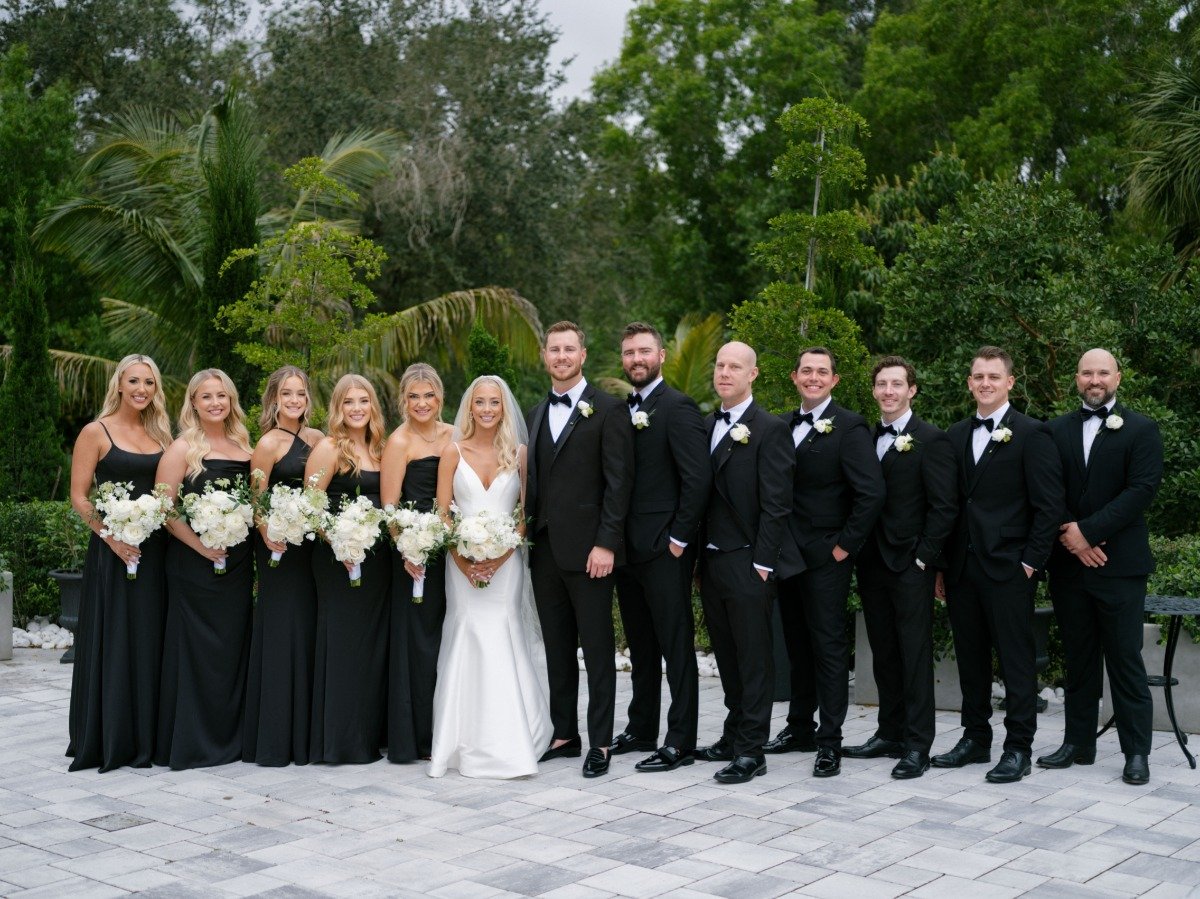 all-black wedding party attire