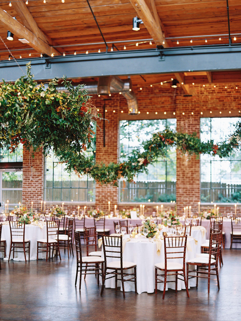 Elegant Atlanta wedding reception with hanging floral installations