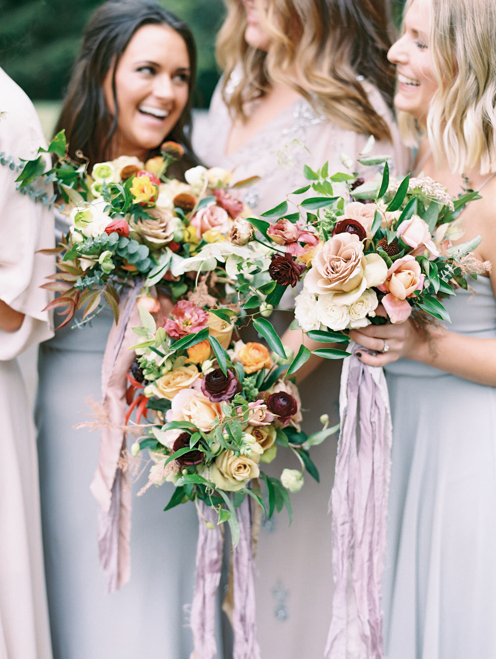 colorful bridesmaids floral bouquets