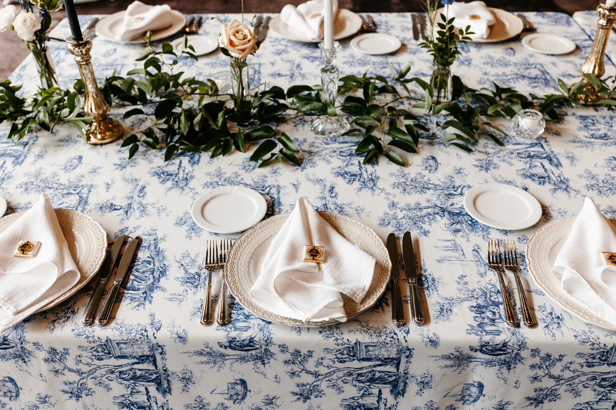 toile tablecloth and simple garland for wedding reception