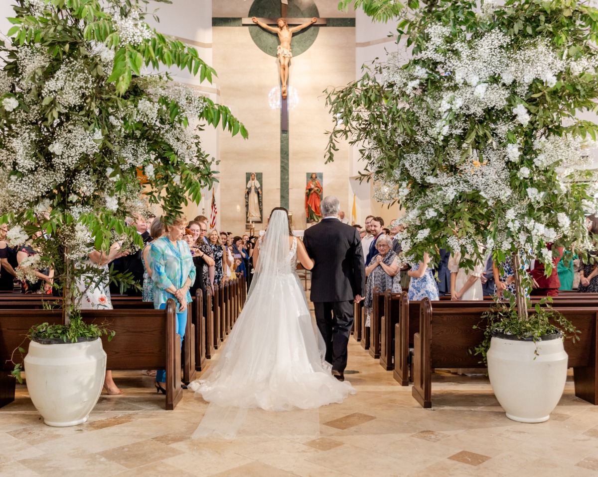 father walks bride down the aisle at florida church wedding