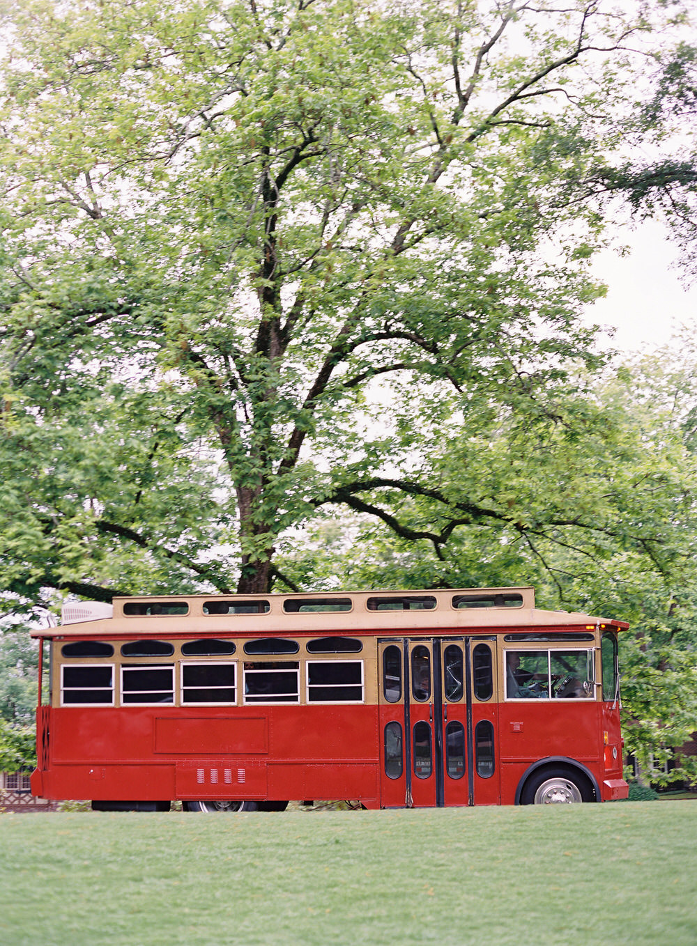 fun wedding transportation in a red tram