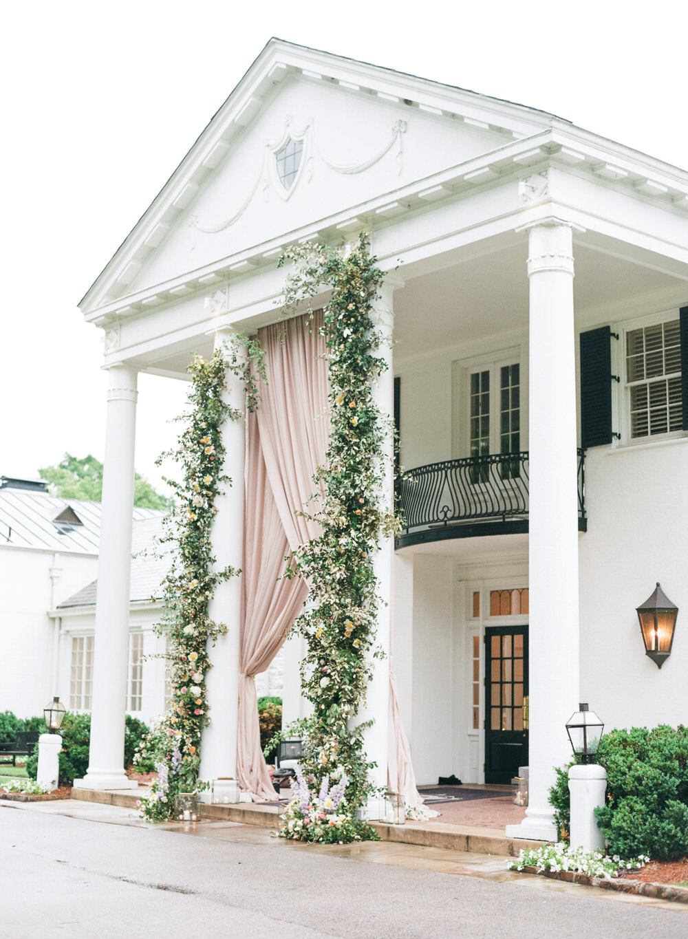 massive blush wedding draping at reception entrance