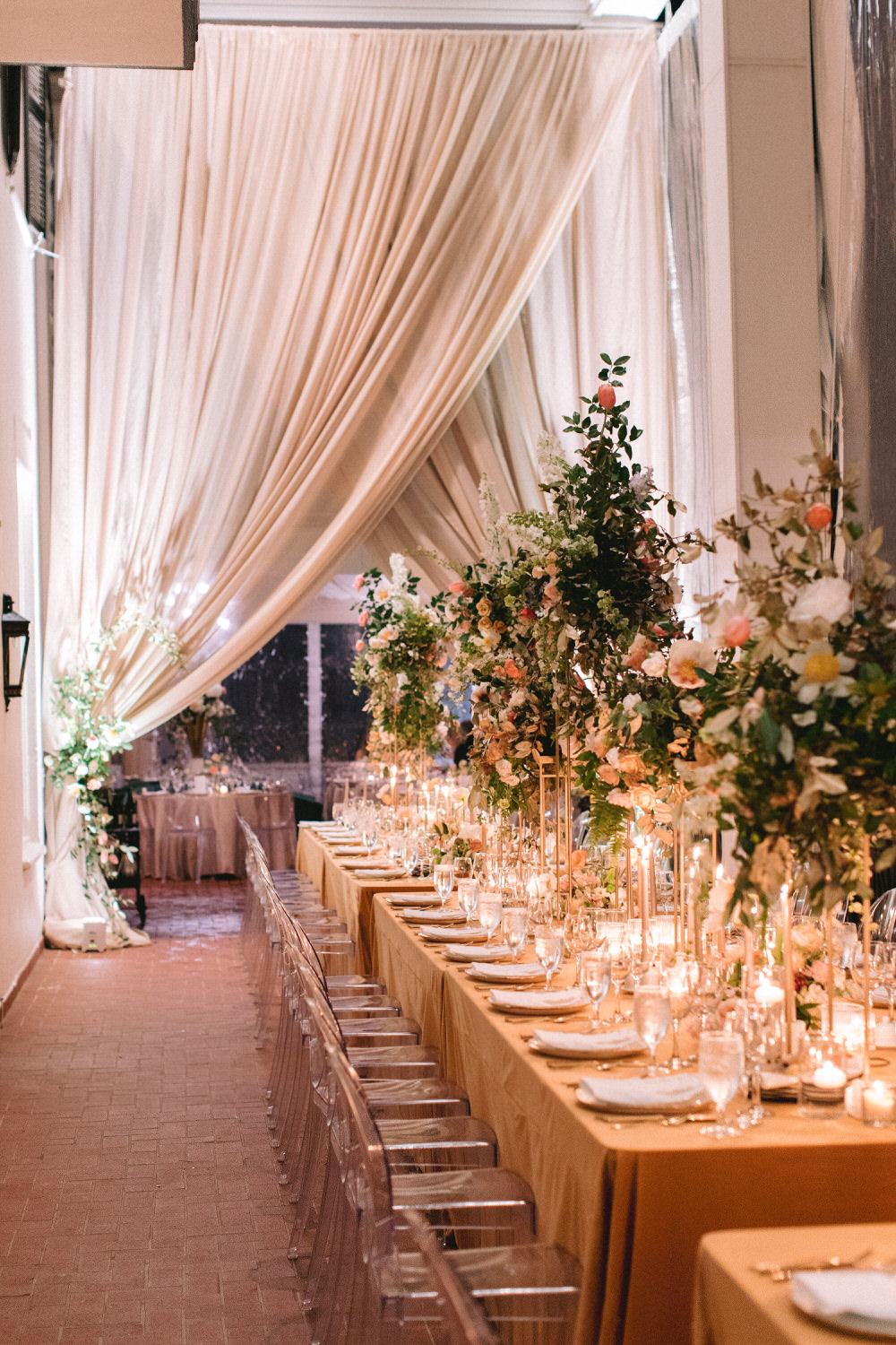 massive wedding reception with a mix of long and circular tables