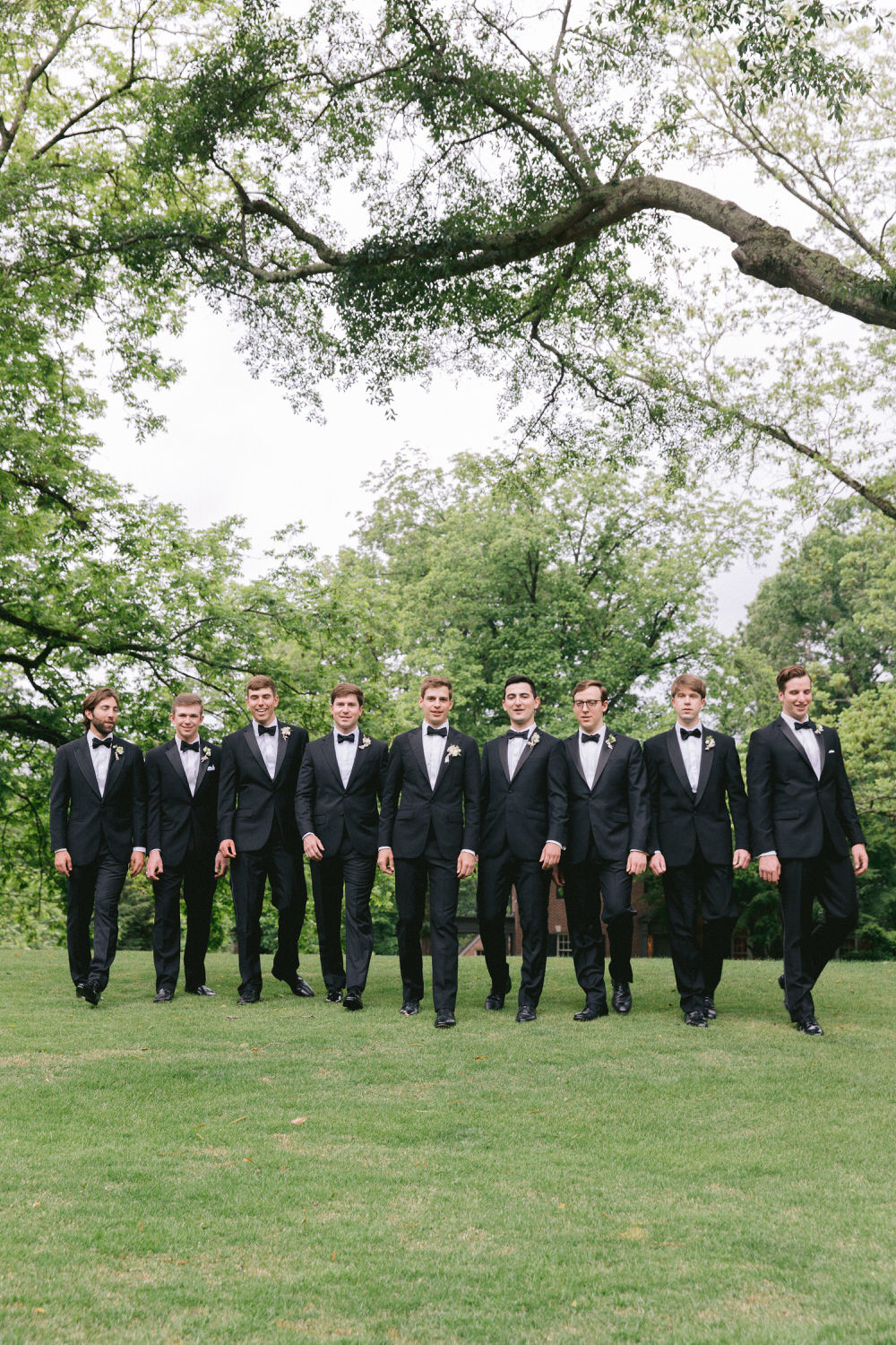 groom walking with his groomsmen