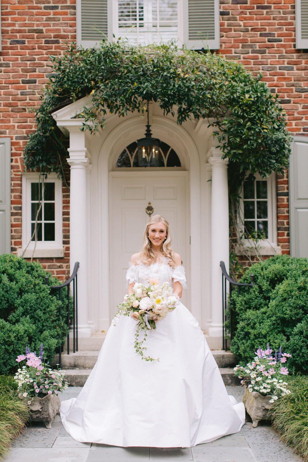 bridal portrait in Birmingham holding her bouquet