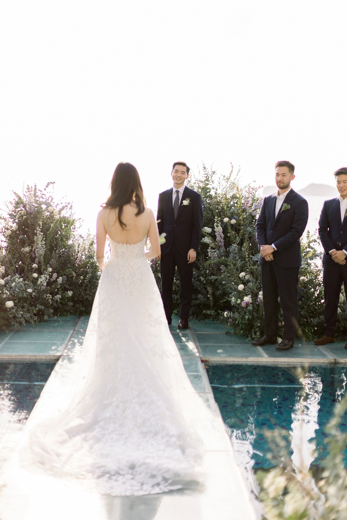 floating poolside wedding ceremony aisle