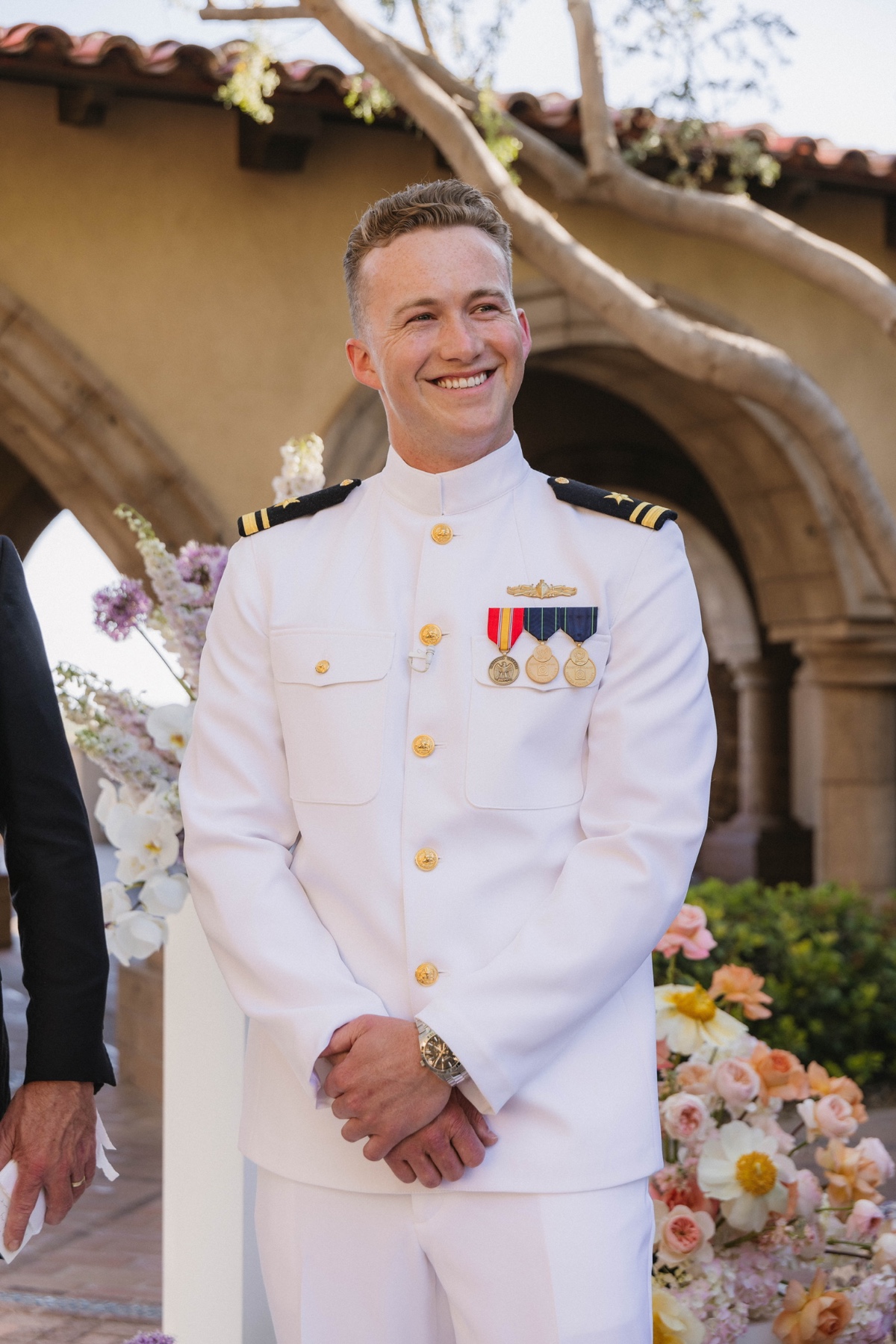 groom in navy dress white uniform 