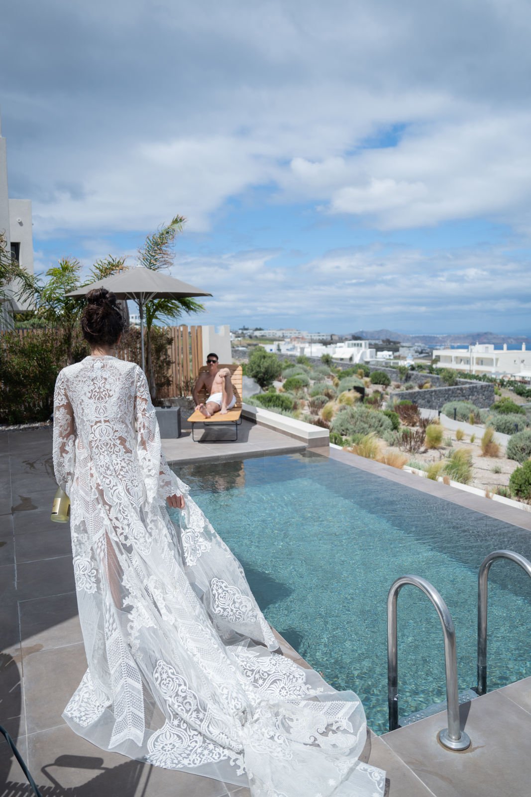 getting ready by the pool for wedding photo ideas