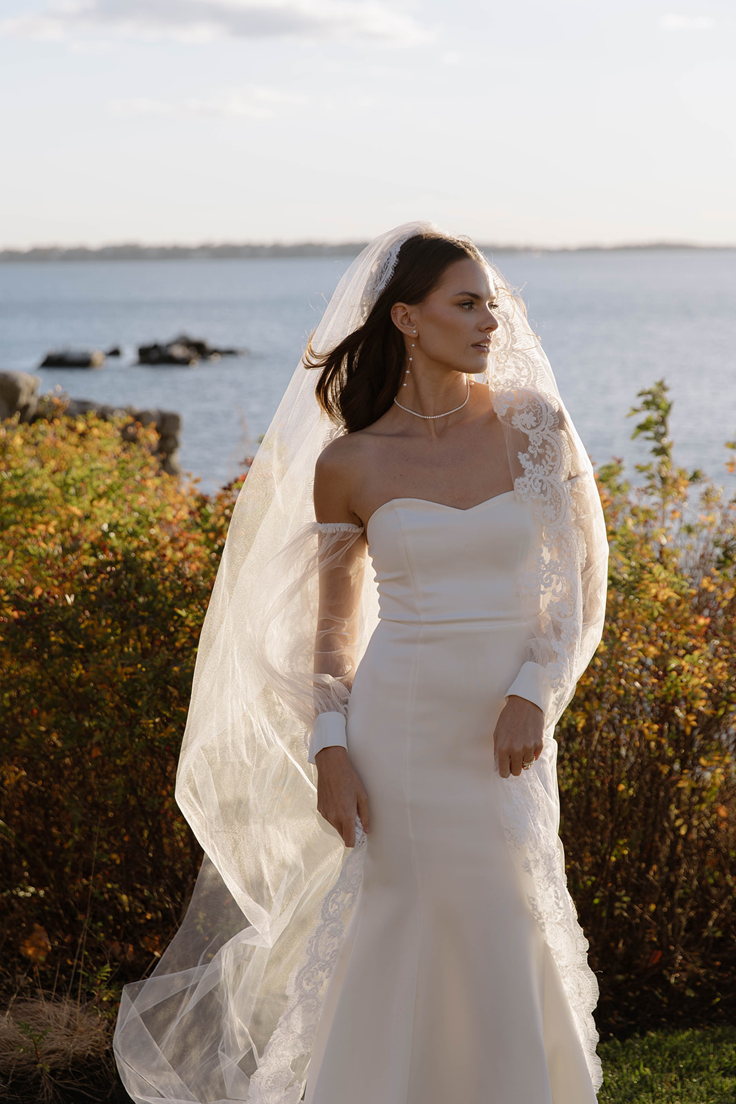 bride with detachable tulle sleeves