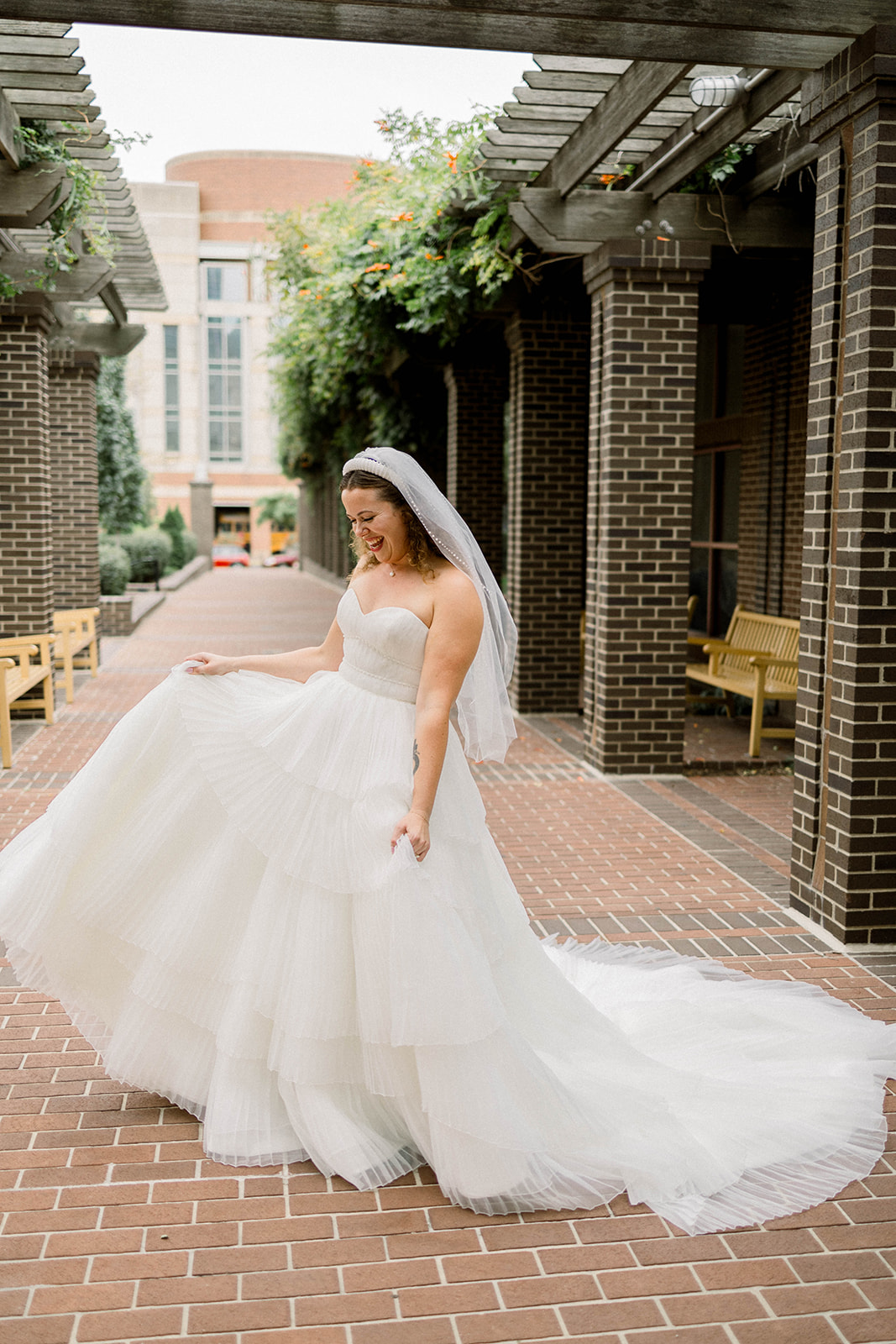 bride in pleated tulle ballgown