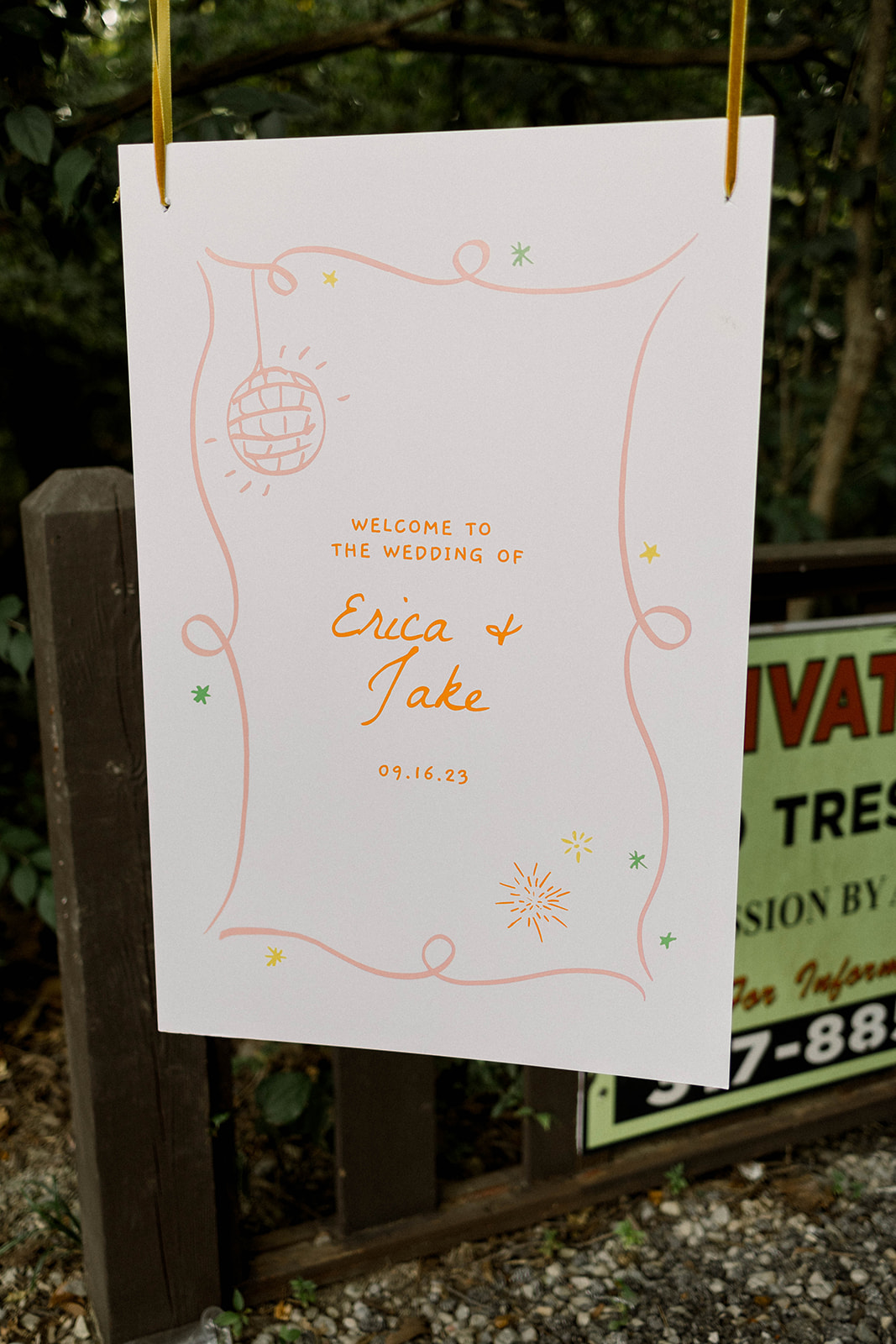 peach and orange wedding signage