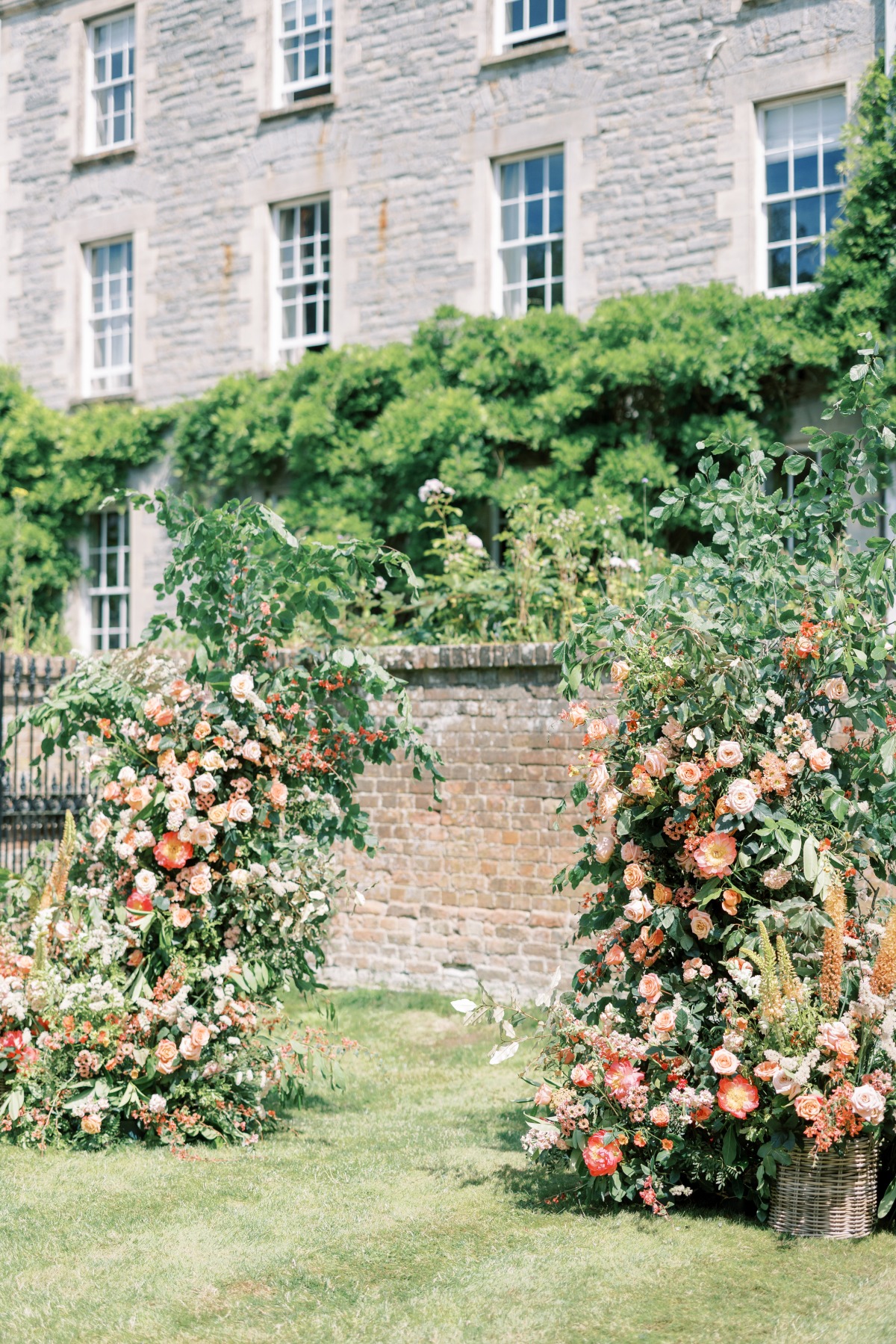 orange wedding floral arch