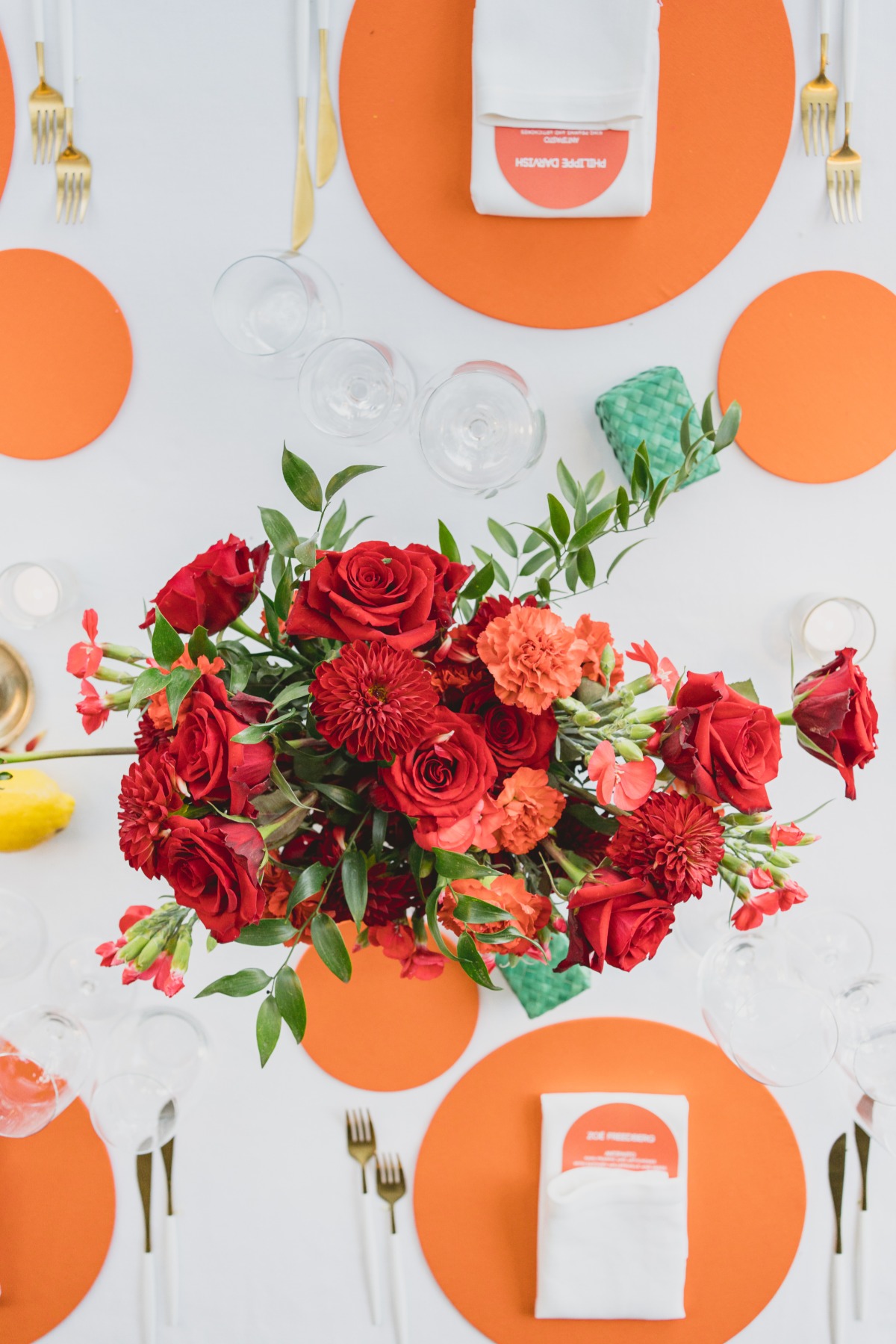 red and orange wedding tablescape