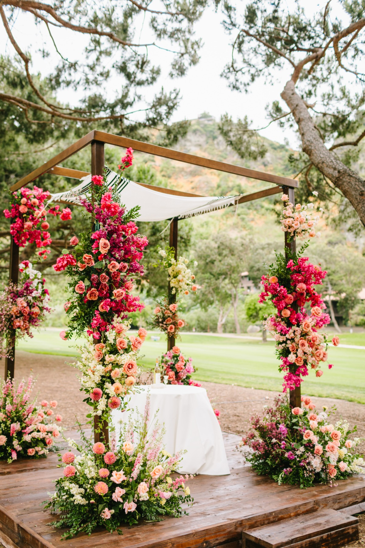 pink floral chuppah for wedding ceremony