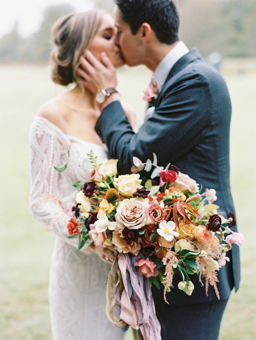 bride and groom kissing portrait