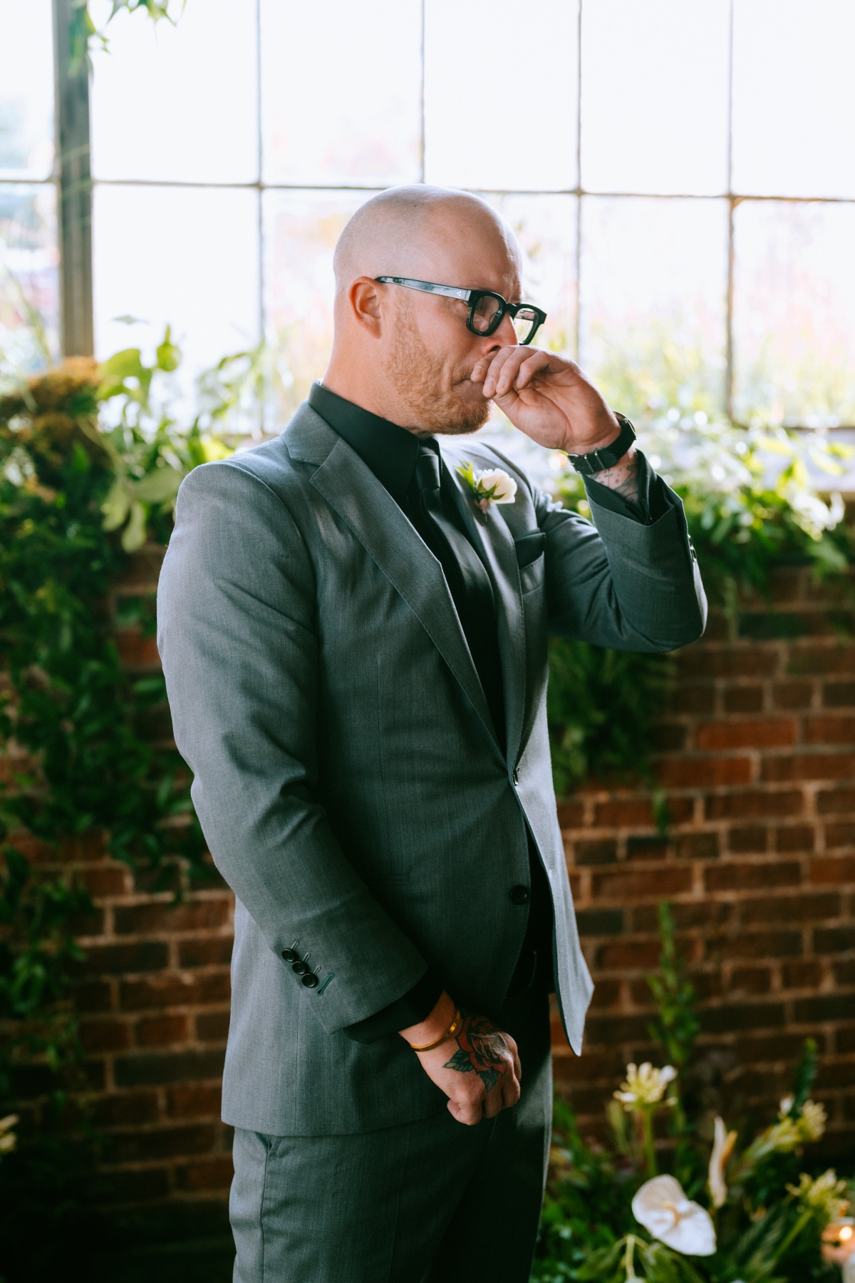 groom in green suit