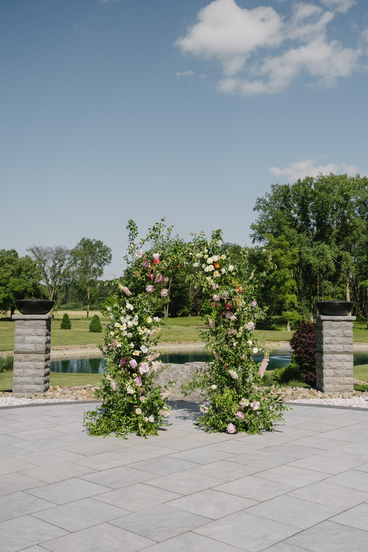 greenery arch with wildflowers