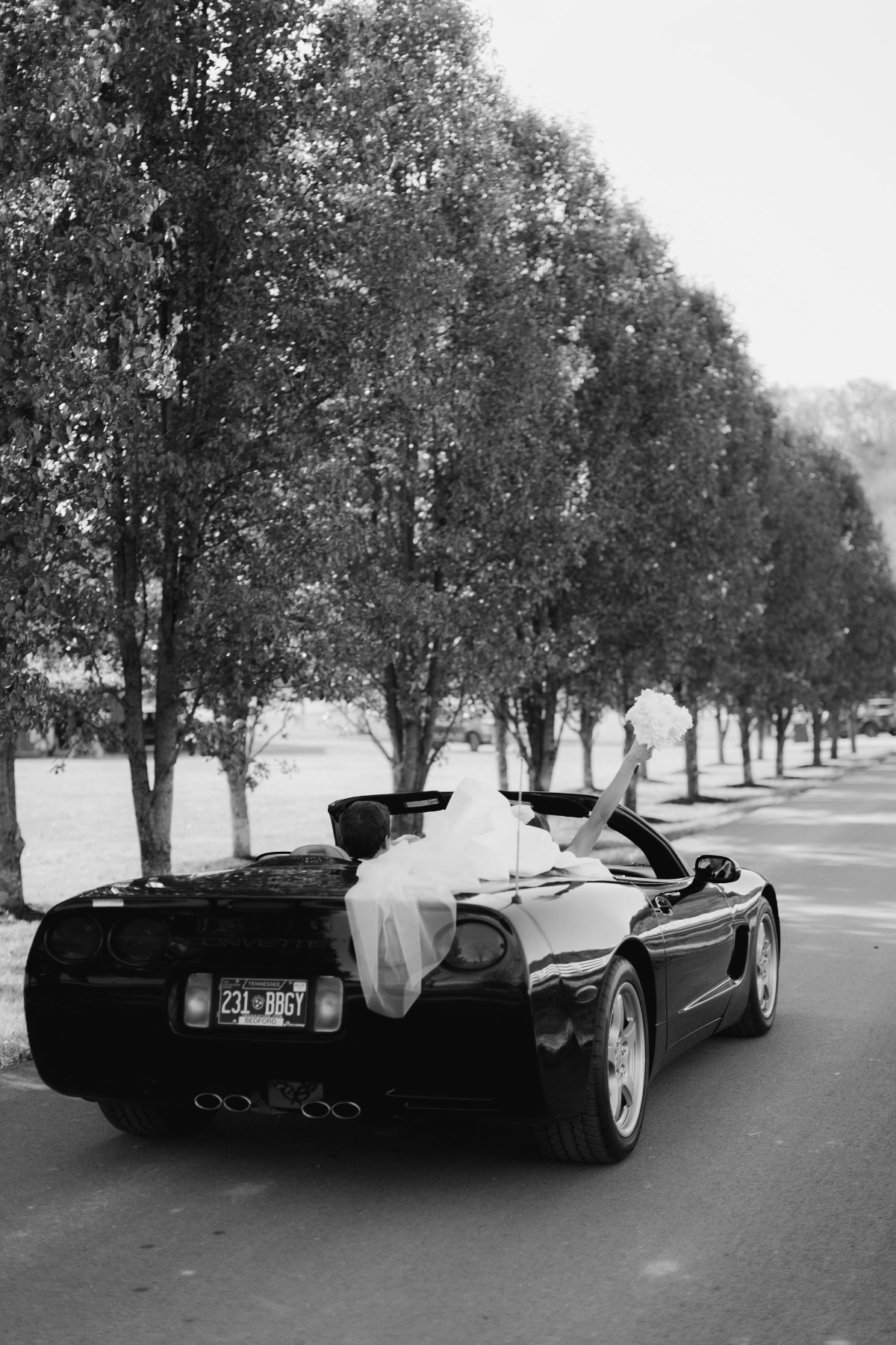 wedding exit in vintage car