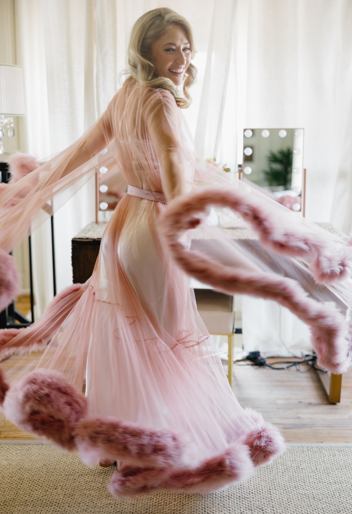 rose colored bridal robe with feathers