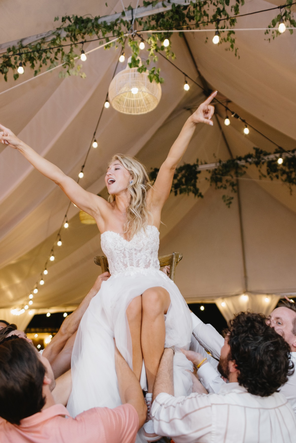 bride on chair dancing