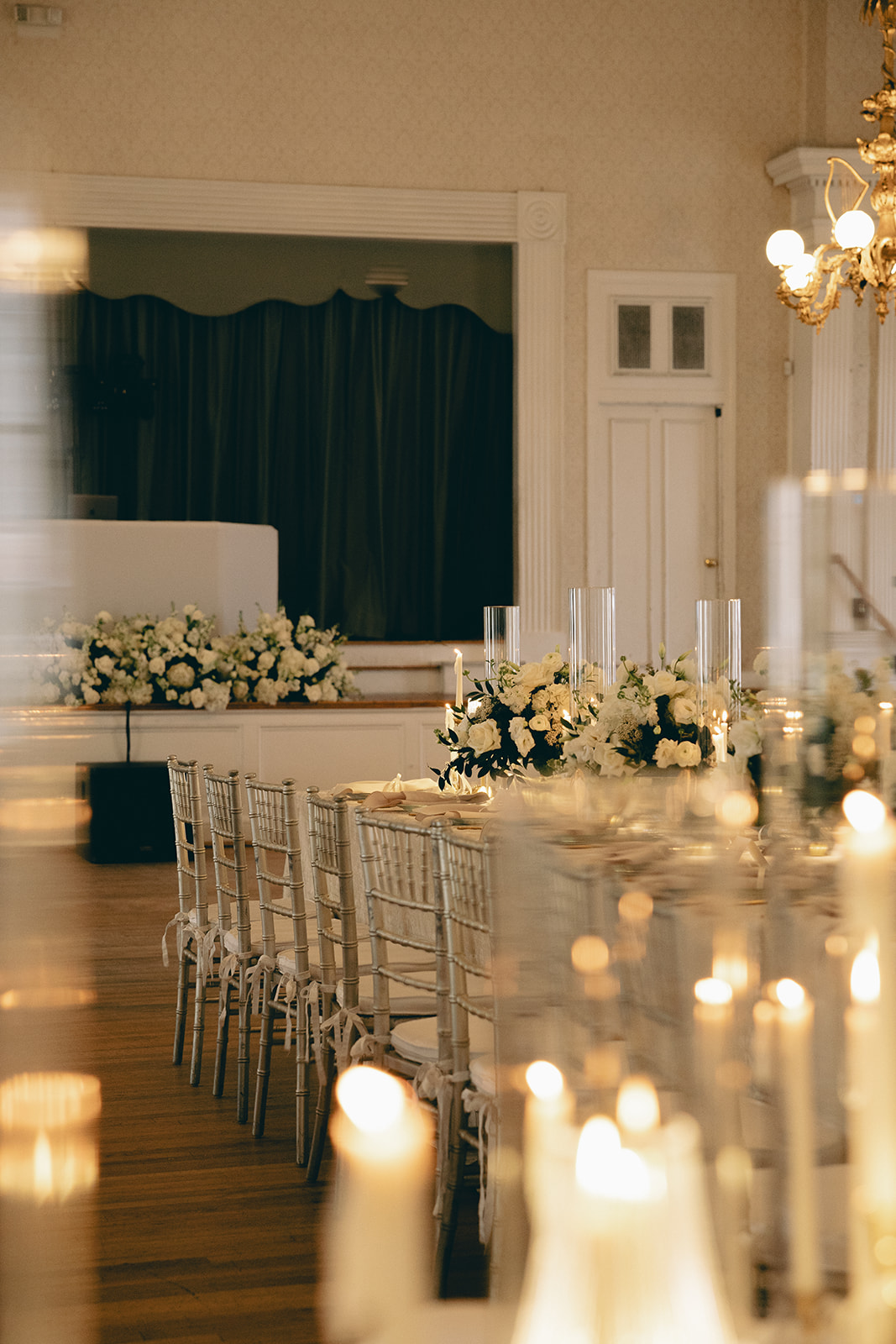 white centerpieces with tapered candles