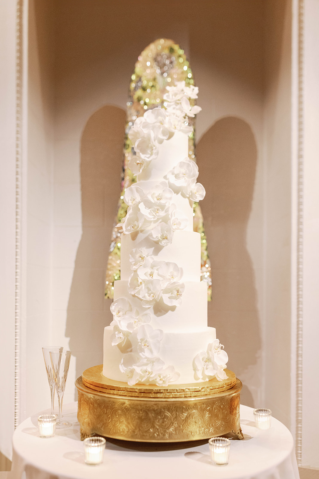 tall wedding cake with sugar flowers