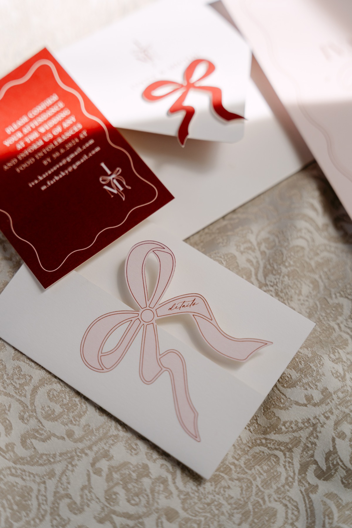 red and pink bow wedding invitations