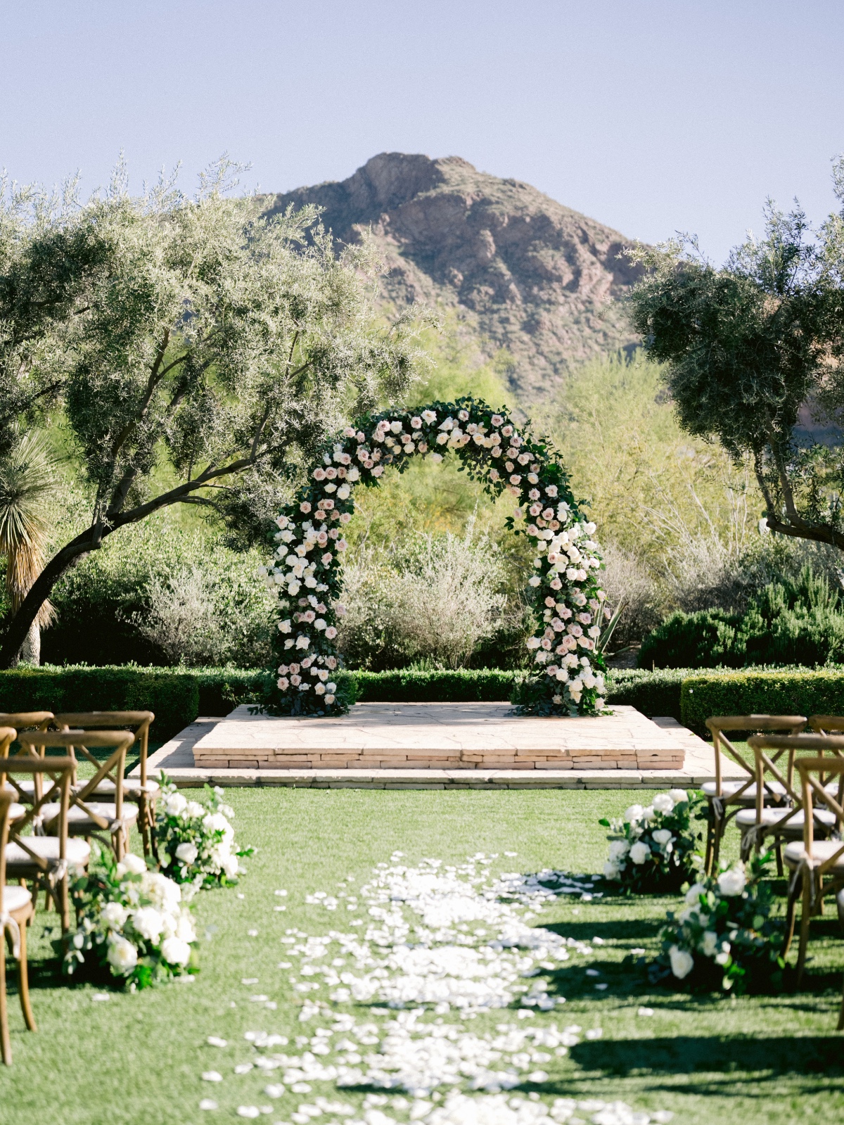 blush and ivory rose floral arch for wedding ceremony