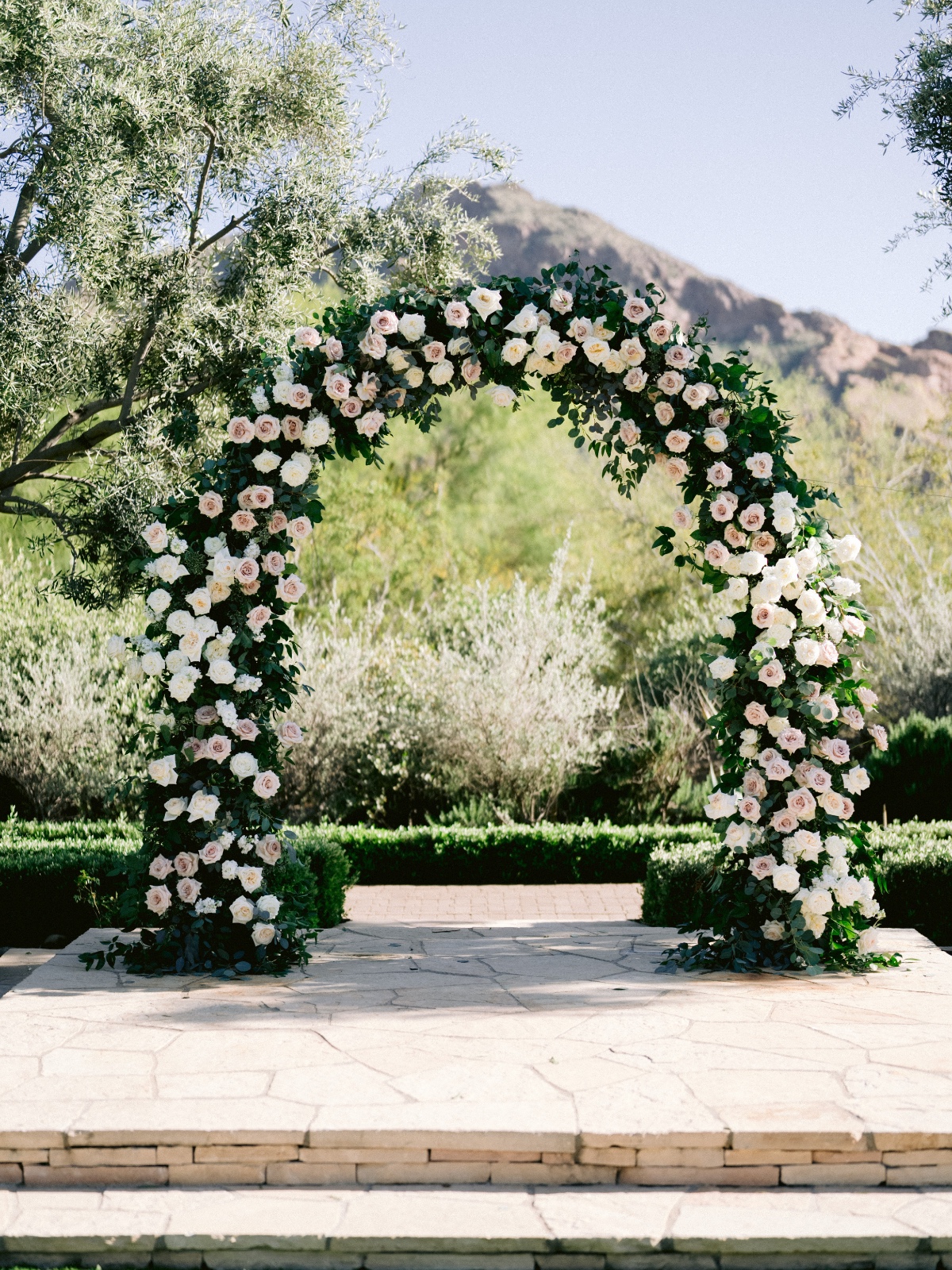 blush and ivory wedding floral arch