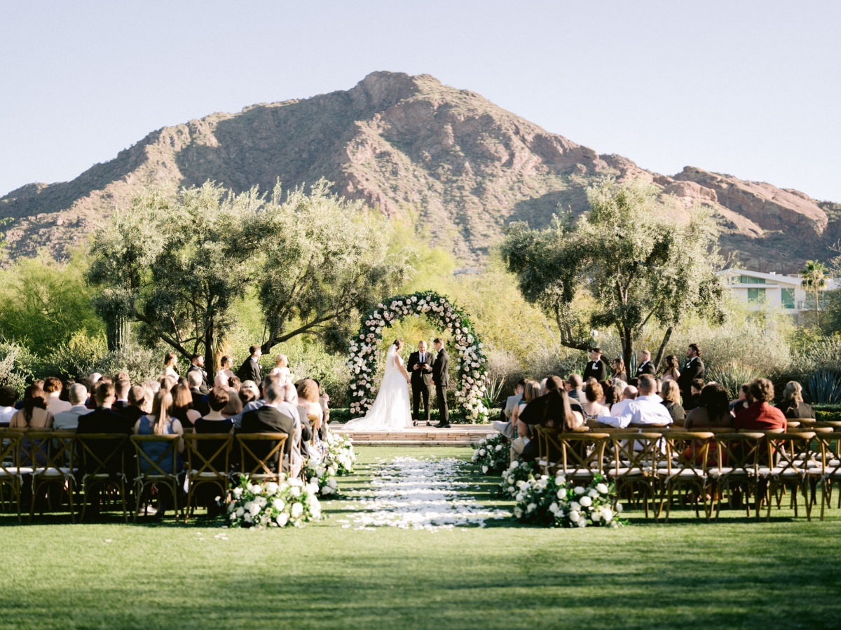 blush wedding in arizona with mountain backdrop