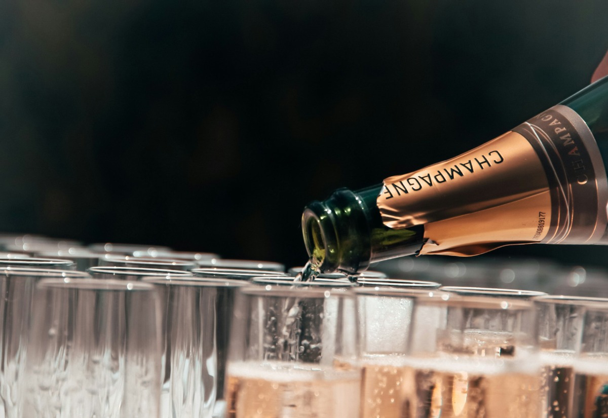 Sparkling rose pouring into glass