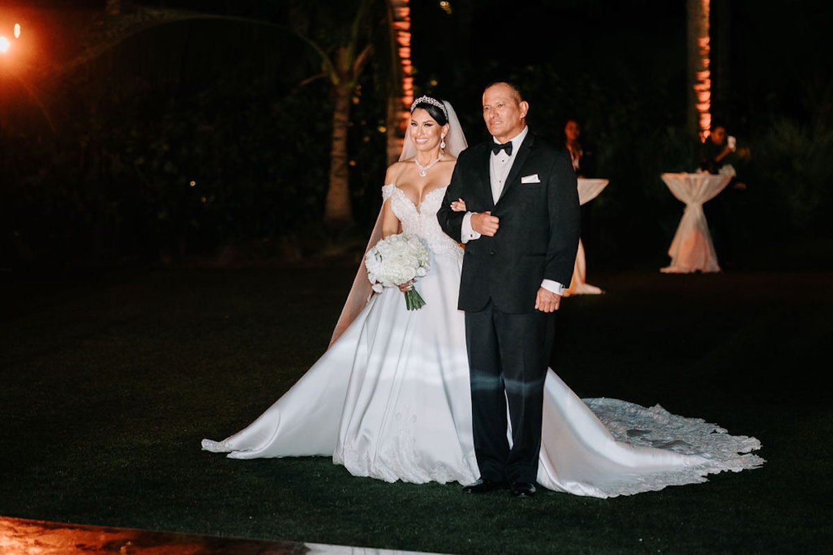 father walking bride down the aisle