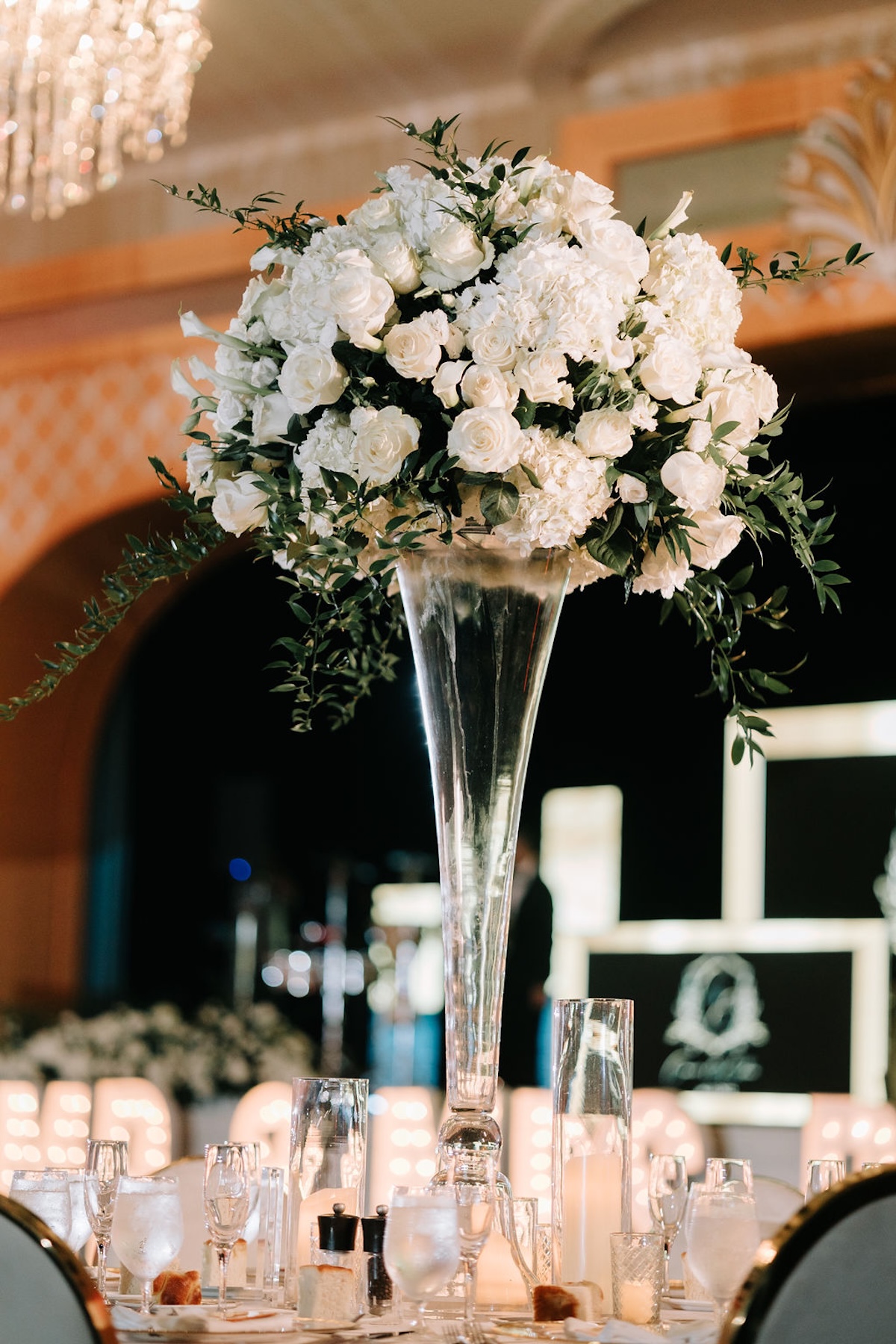 white rose floral arrangement for weddings