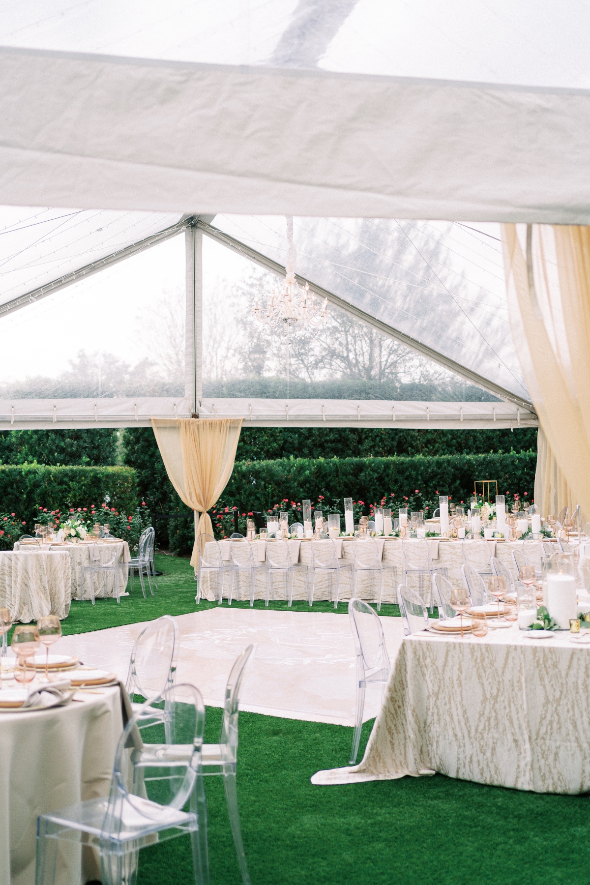 clear tent with gauzy draping