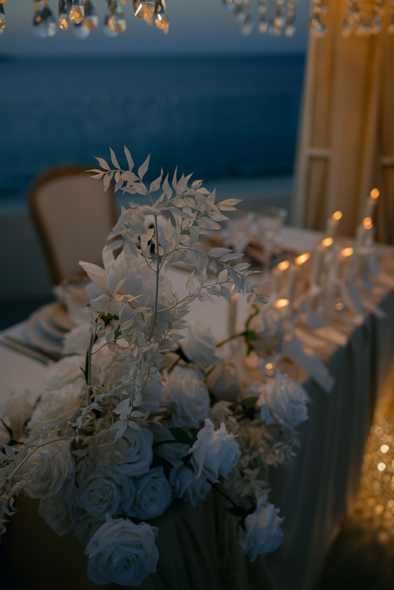 white ferns and white roses