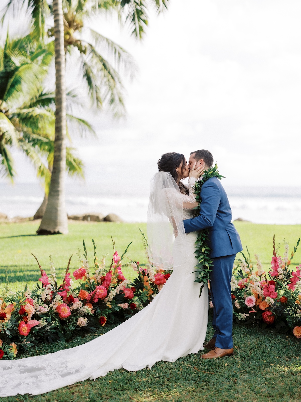 pink and orange u-shaped wedding ceremony flowers