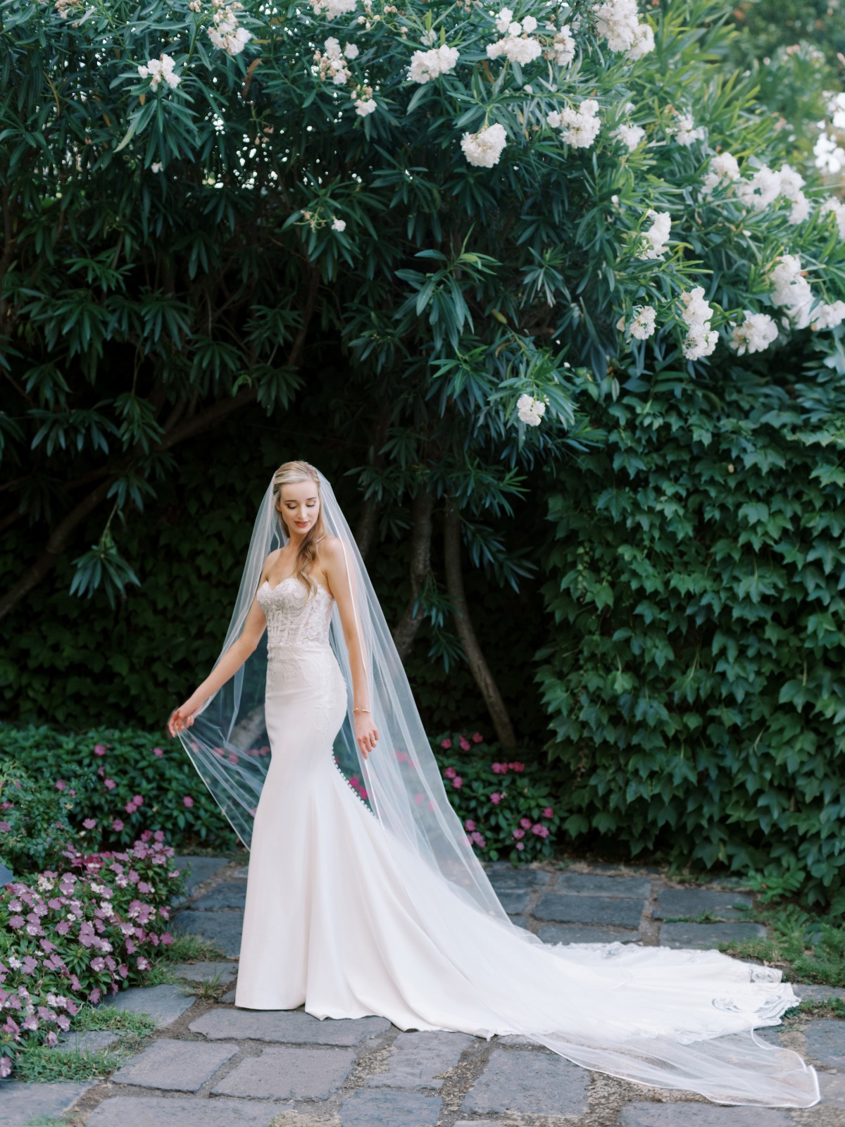 bride in lace and crepe wedding dress