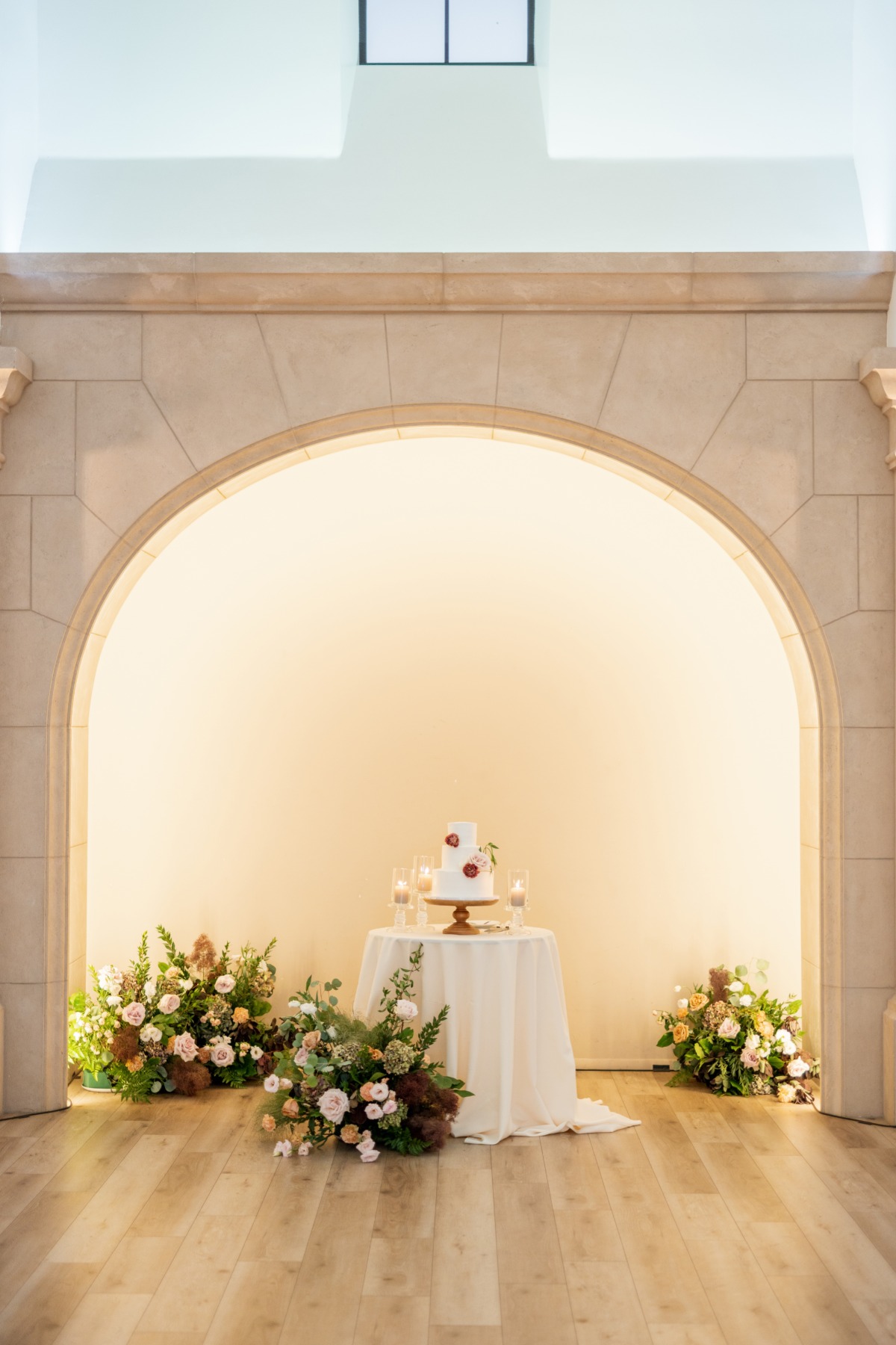 simple wedding cake with fresh flowers