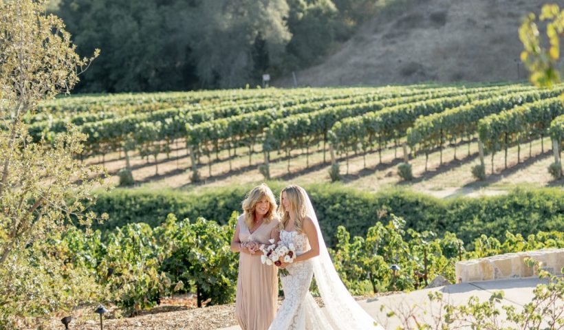 We love the pom-pom exit from this tuscan-inspired vineyard wedding